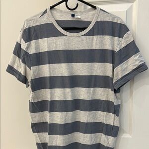 Divided gray striped tshirt. Size medium